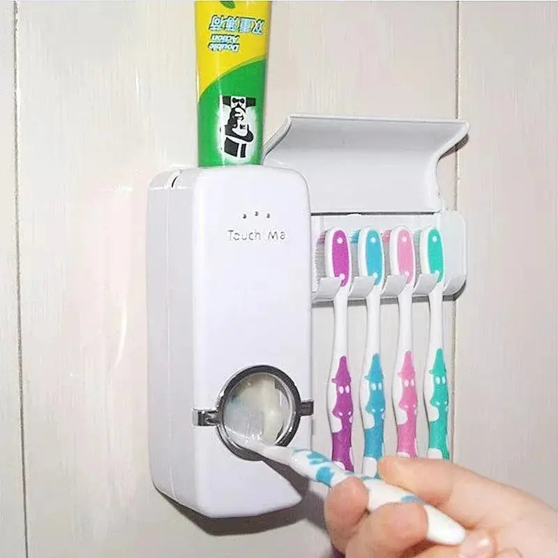 Easy use toothpaste dispenser with toothbrush holder for mess free brushing.