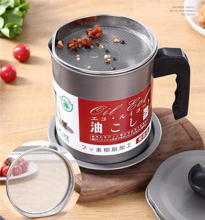 Carbon steel oil filter pot for storing and filtering used cooking oil.
