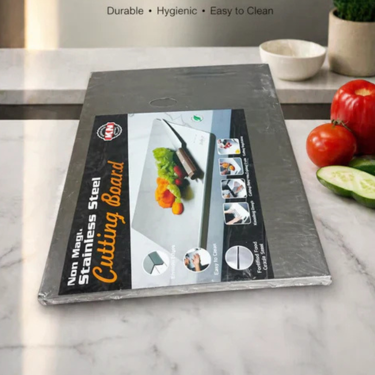 Durable stainless steel kitchen cutting board with smooth surface.