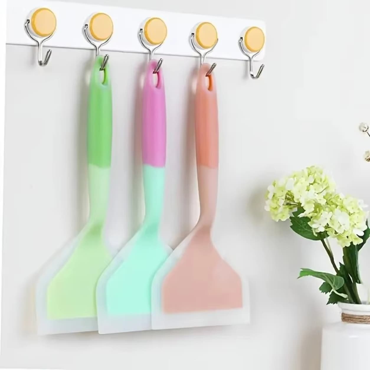 Flexible kitchen silicone spatula tool for easy cooking and baking use.

