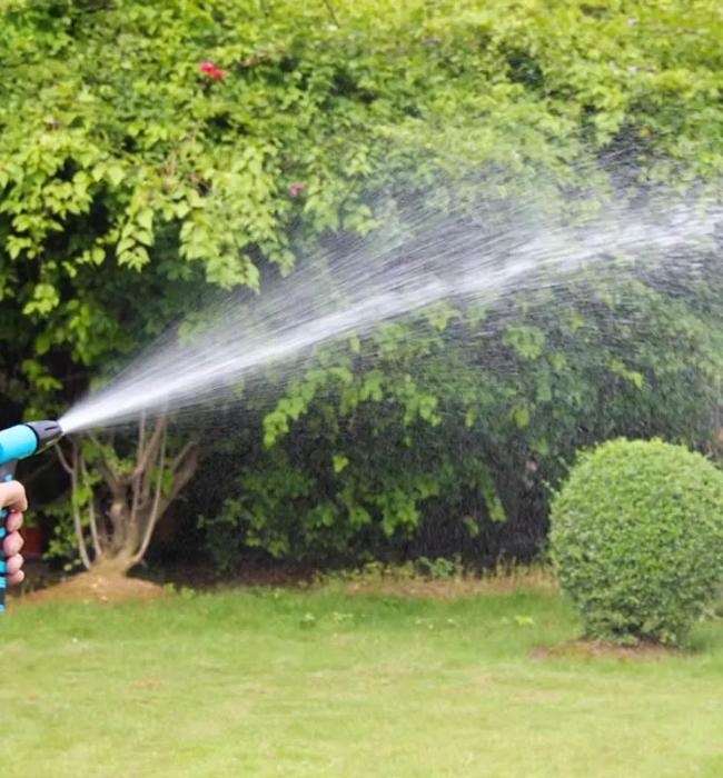 Watering nozzle for plants, lawn, and garden with soft and controlled spray.