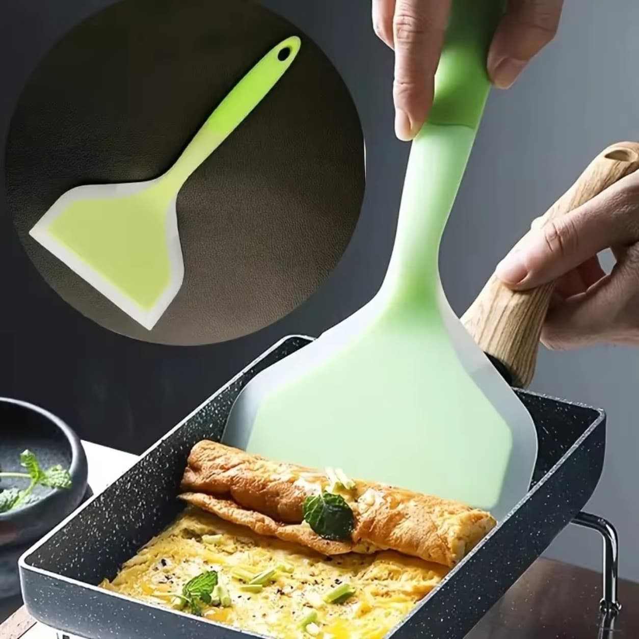 Kitchen silicone spatula tool for mixing, flipping, and serving food easily.