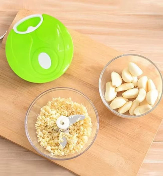 Manual vegetable chopper compact mini cutter for quick kitchen chopping.
