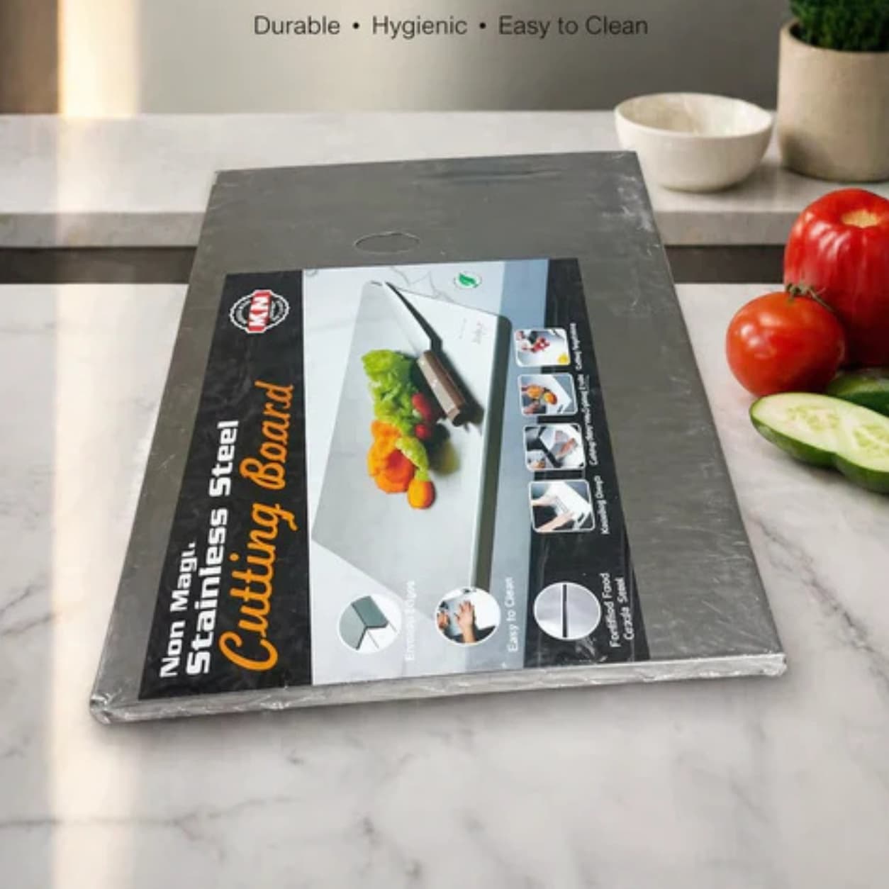 Small medium and large steel cutting boards for meat and vegetables.