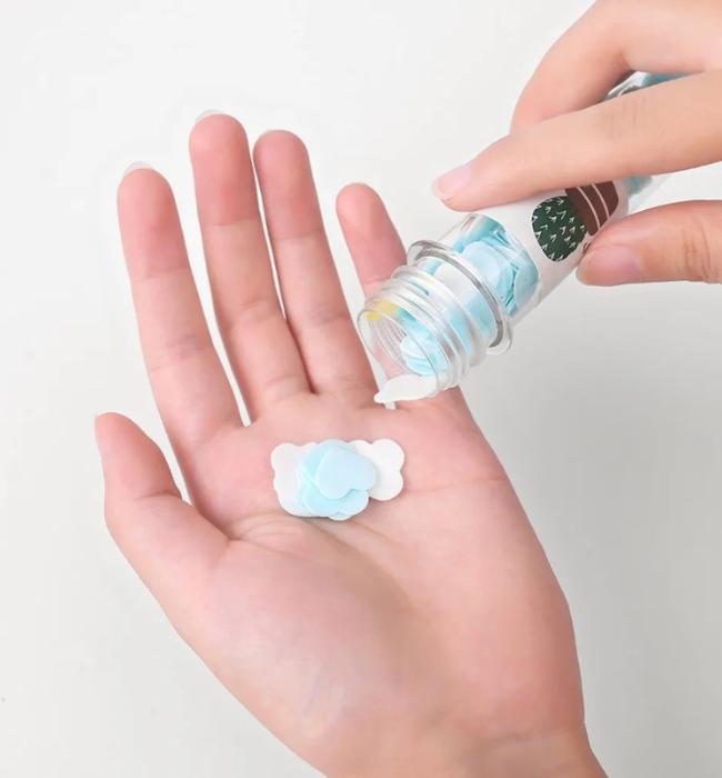 Dissolvable soap sheets for clean hands anywhere during travel and outdoor use.