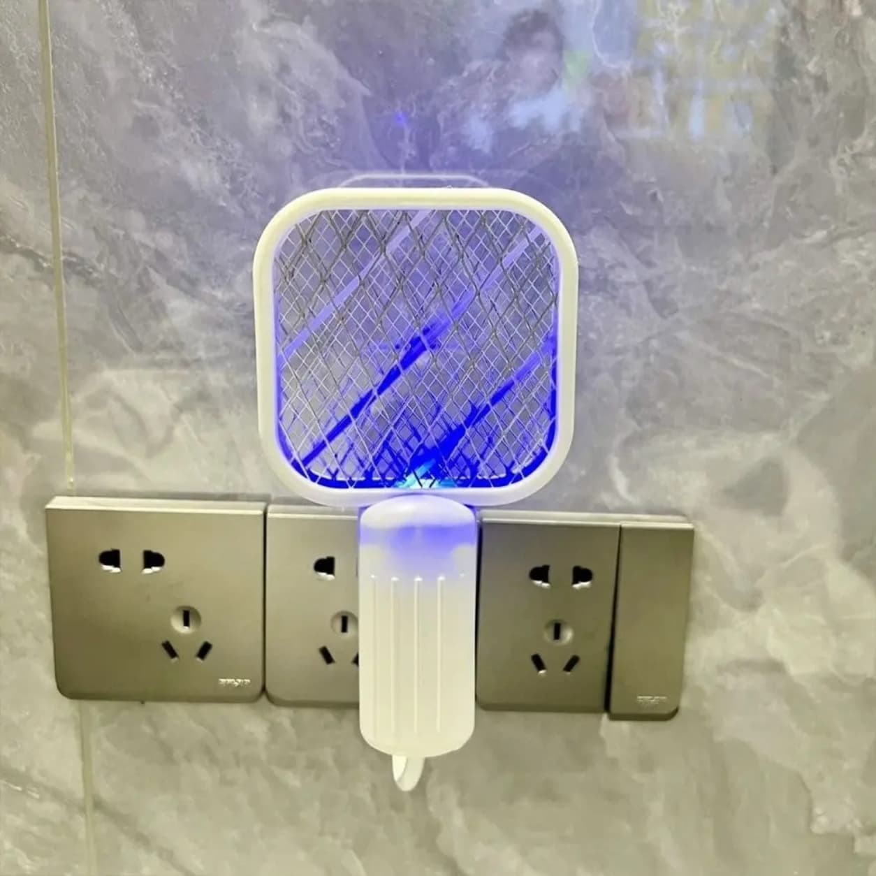 USB electric mosquito swatter for fast insect and bug control.