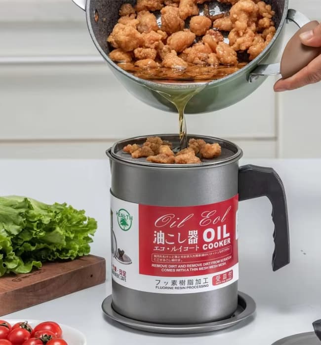 Grease catcher cooking oil filter pot with stainless steel strainer.