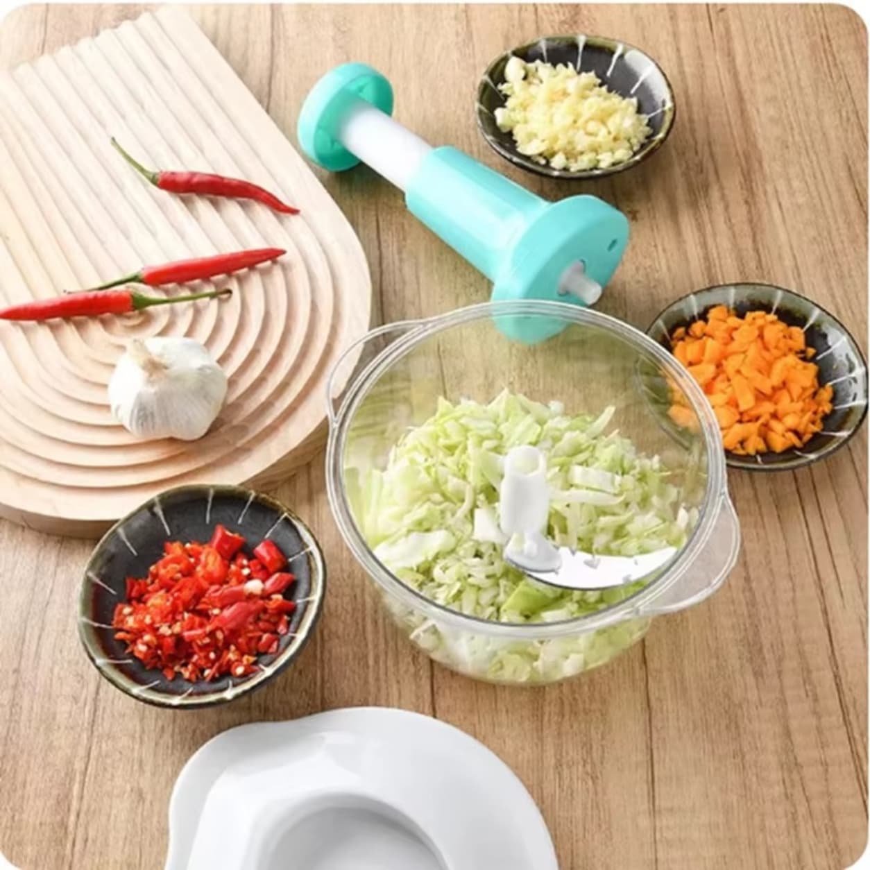 Portable kitchen chopper tool for fast food preparation.