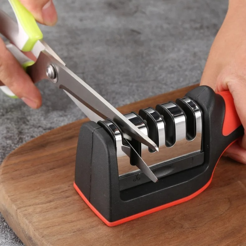Portable knife sharpener designed for kitchen knives and scissors.