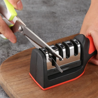 Portable knife sharpener designed for kitchen knives and scissors.